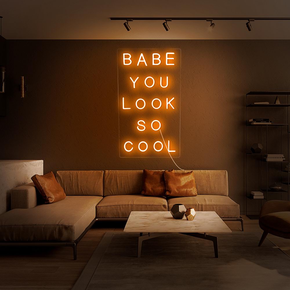 "Babe You Look So Cool" Neon Sign  Hand-made eye-catching neon signs with a service life of 50,000 hours.  This is not just an ordinary neon sign but a neon artwork. Its mission is to light up the future and create an artistic atmosphere.  The size(width) of Neon Sign is available in five sizes, between 50CM-200CM. Usually supports 22 colors, 9 colors are selected for you on the webpage, if you need other colors, you can browse down and let us know.  Neon signs are used in a wide range of applications. They are usually used in home decoration, wedding decoration, outdoor advertising, shop logo, party event decoration